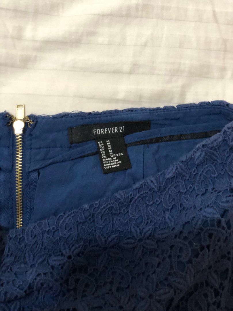 Forever21 Navy Blue Lace Mini Skirt (Category: Skirts) located in Quezon City. Submitted by dai_jia_mei (Listing ID 1433277291, Image 2). Description: Rfs: Decluttering MOP: GCash Buyer in charge of shipping. What you see is what you get. No returns please. Authentic..