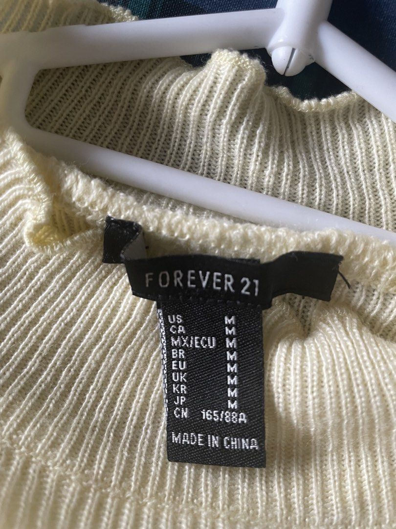 Forever 21 Fine Knit Sweater/Jumper (Category: Longsleeves) located in Manila. Submitted by lazythrifter.ph (Listing ID 1433216918, Image 3). Description: Authentic, like brand new Fitted knit with scalloped neck, hem & sleeves Color: Lemon Yellow Size: US M Shoulder: 14.5” Chest: 15” Length: 18”.