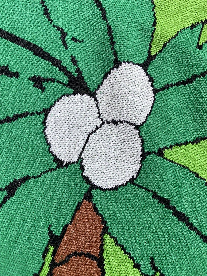 Green Palm Tree Graphic T-shirt (Category: Tshirts & Polo Shirts ) located in Antipolo. Submitted by casmiro (Listing ID 1433318205, Image 3). Description: - Green t-shirt - Features a 'Bon Voyage' palm tree graphic - 'Aloha!' detail on the sleeve - Round neckline - Short sleeves - Made of knit fabric - Perfect for a tropical look!.