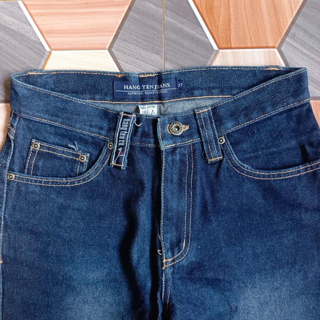 Hang Ten Jeans - Size 27 (Category: Jeans) located in Manila. Submitted by caps08 (Listing ID 1433293863, Image 2). Description: - Hang Ten dark wash jeans - Size 27 - Classic five-pocket design - Straight leg cut - Button and zipper closure - Simple back pocket design - Features Hang Ten logo on front pocket.