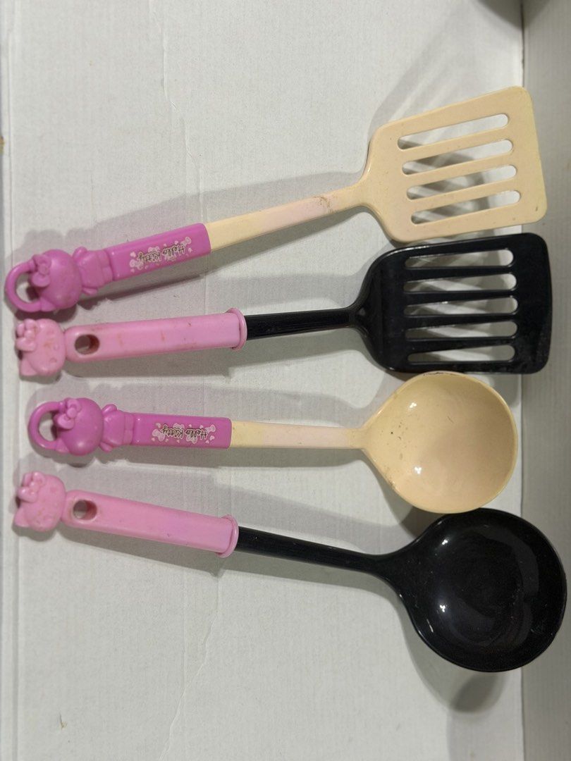 Hello Kitty Kitchen Utensil Set (Category: Other Kitchen Appliances) located in Makati City. Submitted by prelovedkitty13 (Listing ID 1433321611, Image 3). Description: - Kitty kitchen utensil set. - Includes: slotted spatula, solid spatula, ladle, and slotted spoon. - Features pink handles with Kitty design. - Each utensil has a loop for hanging..