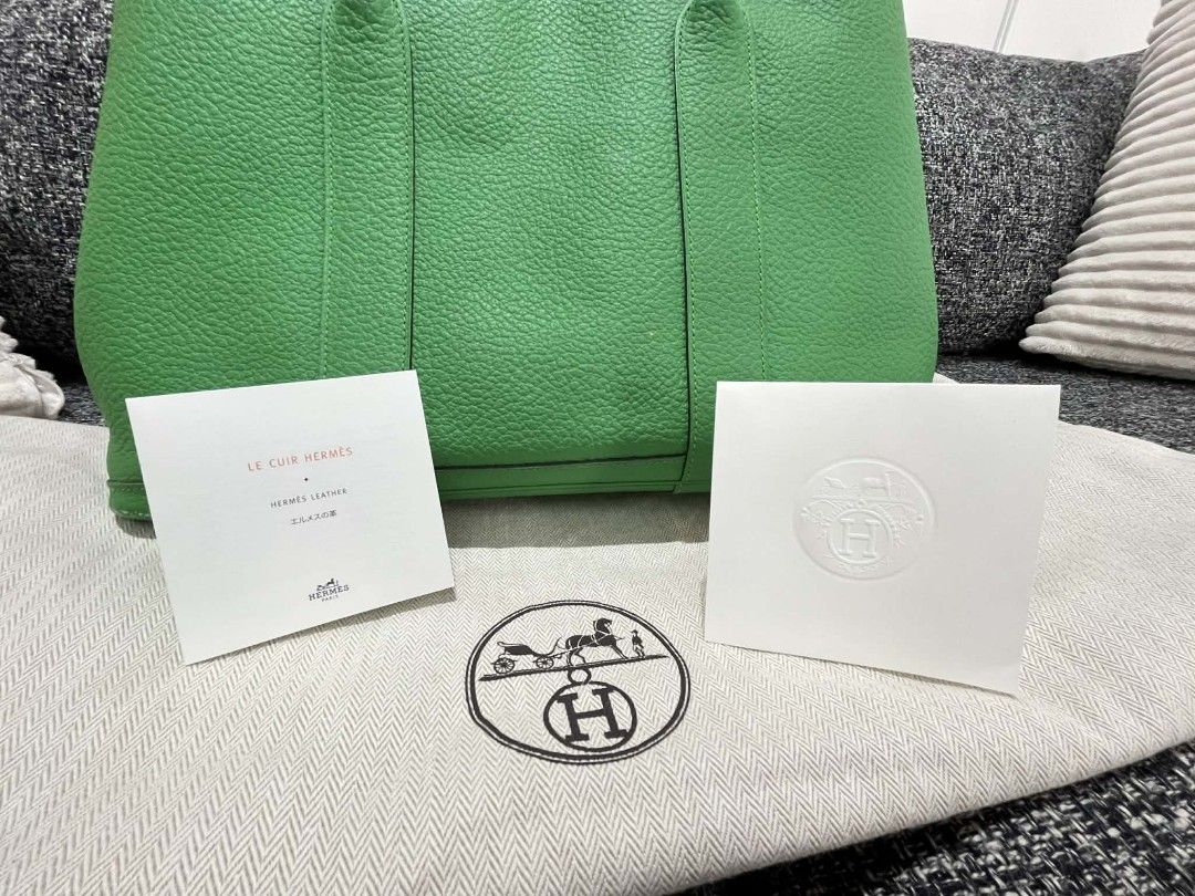 Hermes Garden Party 36 Handbag (Category: Luxury Bags & Wallets) located in Manila. Submitted by mscharmie (Listing ID 1433373563, Image 3). Description: - Authentic Hermes Garden Party 36 - Color: Vibrant Green - Material: Textured Leather - Design: Double top handles, open top - Includes: Dust bag and authenticity cards.