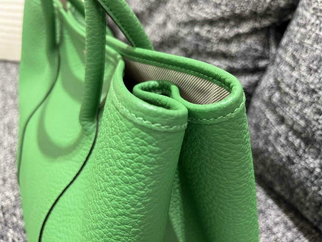 Hermes Garden Party Handbag Green (Category: Luxury Bags & Wallets) located in Manila. Submitted by mscharmie (Listing ID 1433373534, Image 3). Description: - Authentic Hermes Garden Party handbag - Color: Vibrant Green - Features double top handles - Includes authenticity cards and dust bag - Spacious interior meet up only for serious buyer - Textured leather finish - Classic and stylish design - Ideal for everyday use - paladium hardware -clema
