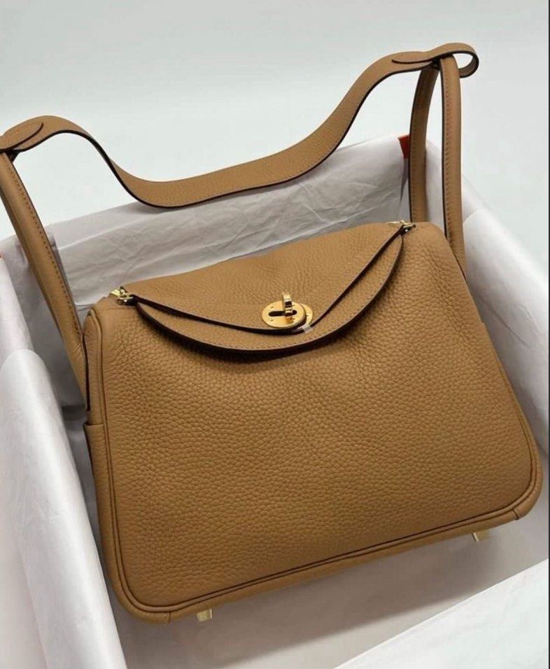 Hermes Lindy 26 (Category: Luxury Bags & Wallets) located in Manila. Submitted by stopshop26 (Listing ID 1433300696, Image 2). Description: Hermes Lindy 26 Color: Biscuit GHW Mind condition Complete inclusion except box Guaranteed 100% authentic Onhand and ready to ship .
