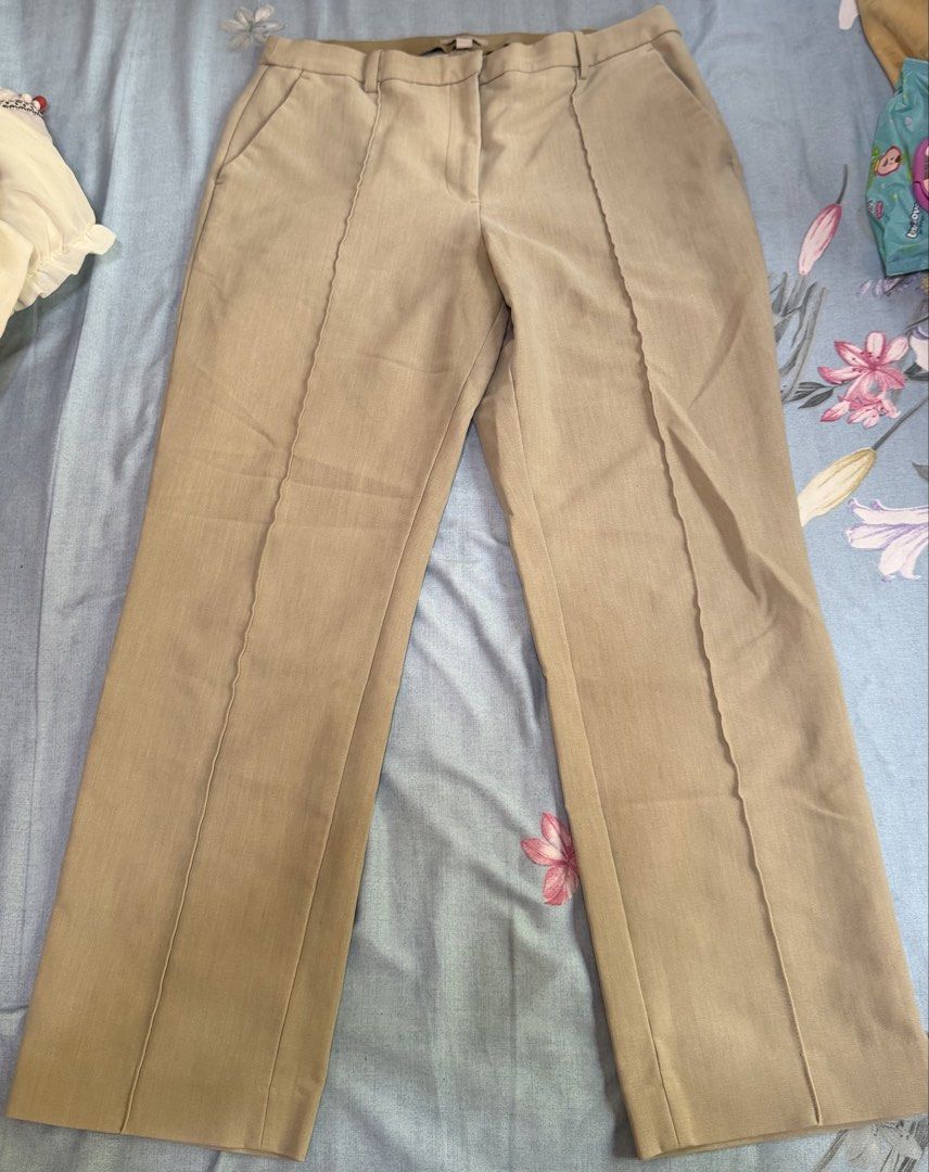 H&M Beige Trousers - EUR 40 (Category: Other Bottoms) located in Cebu City. Submitted by hellomolly_ (Listing ID 1433351483, Image 1). Description: - H&M beige trousers - Classic tailored fit - Size: EUR 40, US 6, CA 8, MX 5, CN 165/76A - Front zipper and pockets - Suitable for casual and formal wear - Comfortable, draping fabric - Office wear.