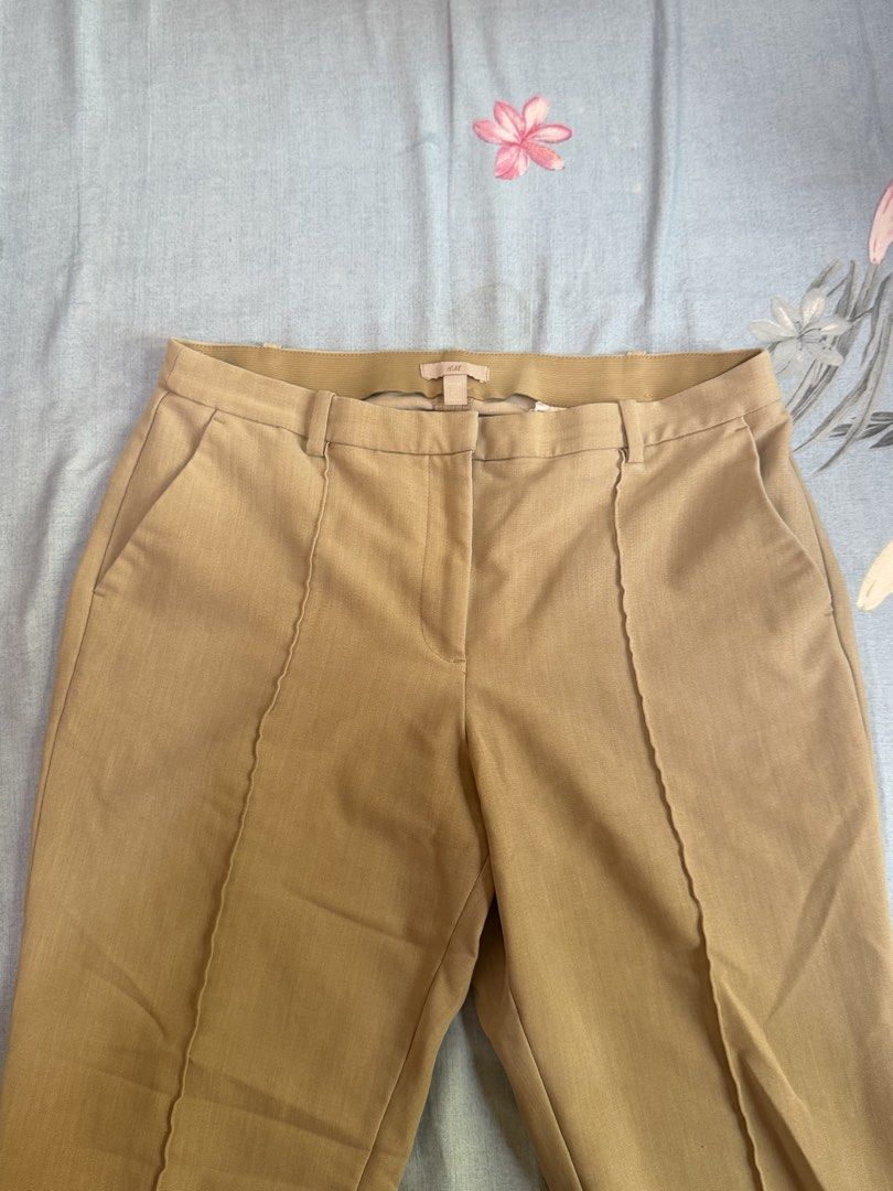 H&M Beige Trousers - EUR 40 (Category: Other Bottoms) located in Cebu City. Submitted by hellomolly_ (Listing ID 1433351483, Image 2). Description: - H&M beige trousers - Classic tailored fit - Size: EUR 40, US 6, CA 8, MX 5, CN 165/76A - Front zipper and pockets - Suitable for casual and formal wear - Comfortable, draping fabric - Office wear.