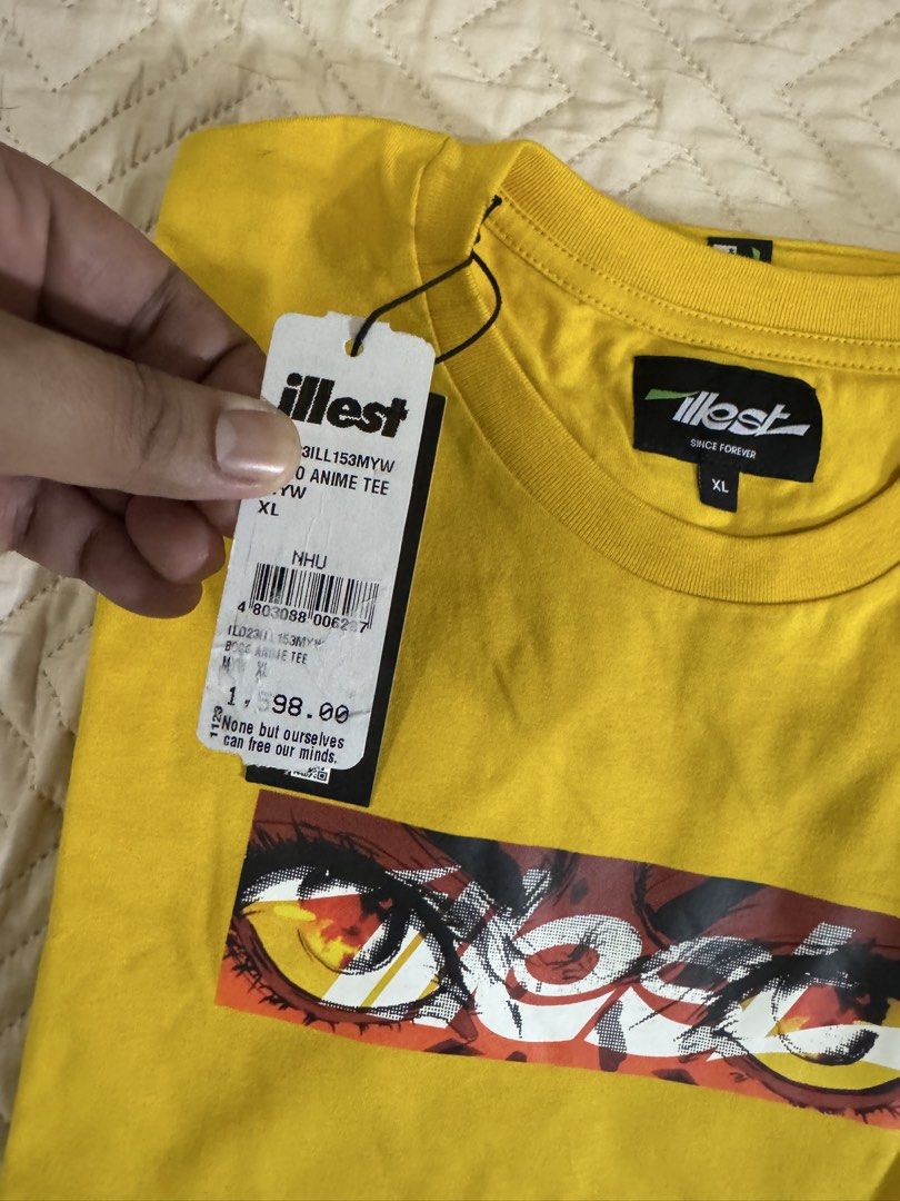 Illest Anime Eye & Fire Eye Tee XL (Category: Tshirts & Polo Shirts ) located in Las Pinas. Submitted by joneldizon (Listing ID 1433313616, Image 2). Description: - Illest XL t-shirts available. - Anime Tee: Yellow shirt with anime eye design. - Fire Eye Tee: Green shirt with car design. - Both shirts feature the Illest logo. - Both shirts have tags attached. - Brandnew with Tag and Price - Dimes: 24”x 31” -💯 Legit or free kapag fake -Price: 600