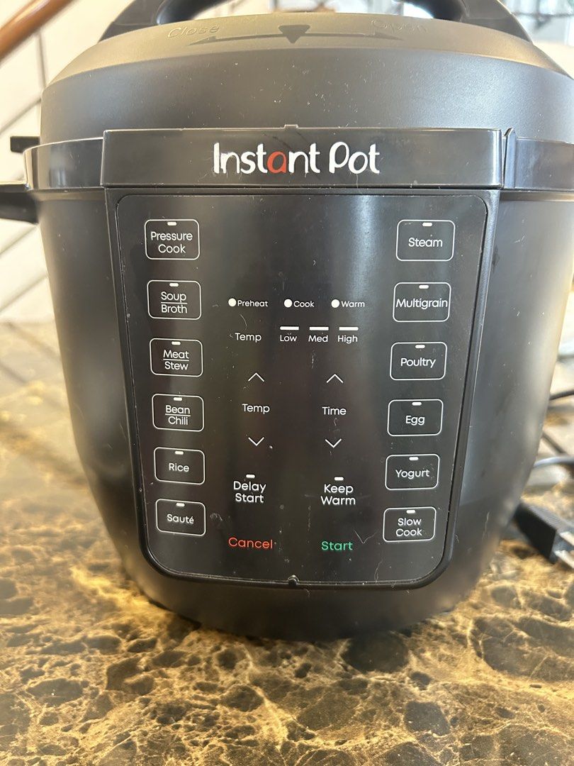 Instant Pot Electric Pressure Cooker (Category: Cookers) located in Makati City. Submitted by declutter__queen (Listing ID 1433315080, Image 2). Description: Instant Pot electric pressure cooker has multiple cooking functions including pressure cook, steam, and slow cook. It features a digital display with preset options for various dishes. The cooker has a 6-quart volume and a power rating of 1000W. It includes a steam release valve and a non-st