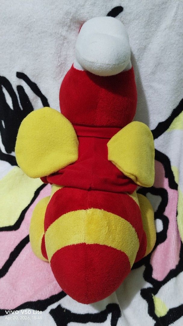Jollibee 30th Anniversary Plush Toy (Category: Plushies & Soft Toys) located in Mabalacat. Submitted by whowannashoppe (Listing ID 1433318154, Image 3). Description: - Special/limited edition Jollibee plush toy. - Rare collectibles - Celebrates the 30th anniversary. - Features Jollibee holding a heart-shaped pillow. - Classic red and yellow color scheme. - Includes a chef's hat and bow tie. - Approximately 12 inches long. - Made in China. - In ve
