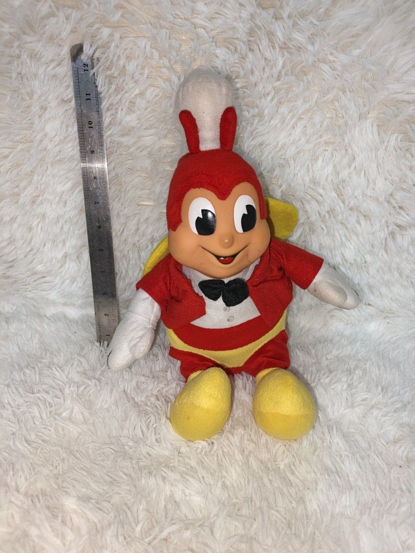 Jollibee Mascot Plush Toy (Category: Plushies & Soft Toys) located in Marikina City. Submitted by andreah_16 (Listing ID 1433360493, Image 1). Description: - Authentic Jollibee plush toy - Features the iconic Jollibee mascot - Classic outfit: red jacket, yellow pants, black bow tie - Includes white gloves and yellow wings - Size reference available.
