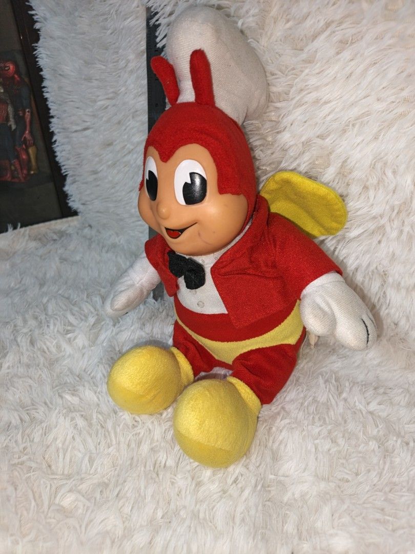 Jollibee Mascot Plush Toy (Category: Plushies & Soft Toys) located in Marikina City. Submitted by andreah_16 (Listing ID 1433360493, Image 2). Description: - Authentic Jollibee plush toy - Features the iconic Jollibee mascot - Classic outfit: red jacket, yellow pants, black bow tie - Includes white gloves and yellow wings - Size reference available.
