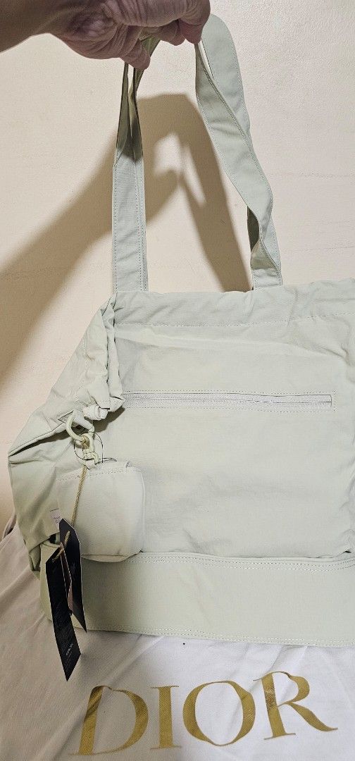 Kangol Jerry Tote Bag - Lt. Green (Category: Tote Bags) located in Cebu City. Submitted by dg_enterprise (Listing ID 1433349310, Image 3). Description: - Kangol Jerry Tote Bag in Lt. Green - Front zipper pocket - Includes a small matching pouch - Top handle and adjustable strap - Style: K088-TB39476 - Made with Mipan Regen fabric.