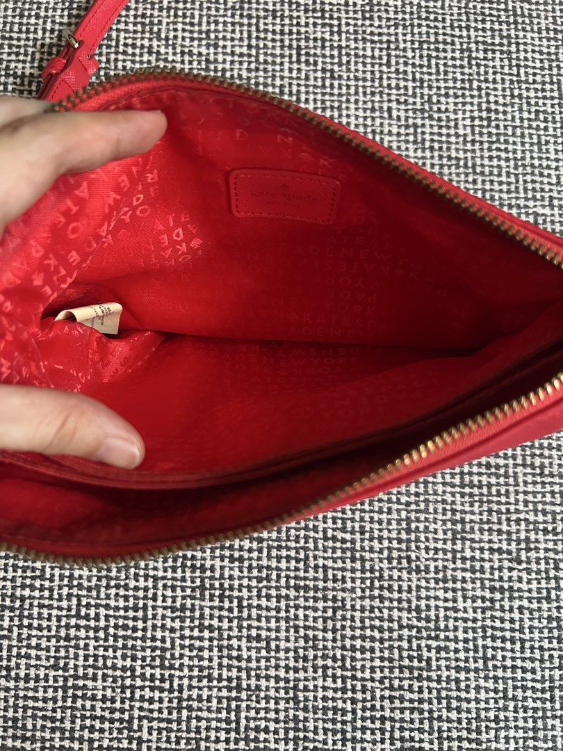 Kate Spade Red Crossbody Bag (Category: Cross-body Bags) located in Manila. Submitted by declutteringmomma_ida (Listing ID 1433253703, Image 3). Description: - Vibrant red Kate Spade crossbody bag - Adjustable long strap - Secure zippered main compartment - Multiple interior pockets for organization - Small Kate Spade logo on the front - Red interior lining with Kate Spade logo.