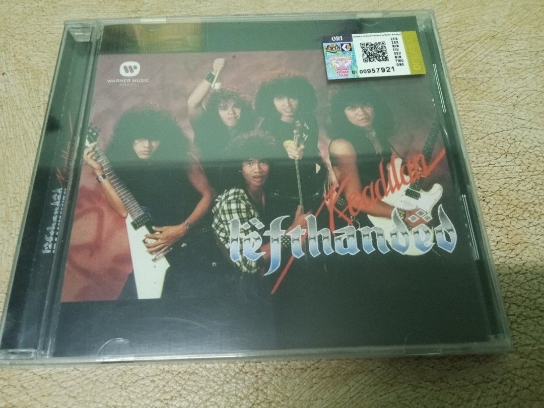 Lefthanded - Adicctos CD (Category: CDs & DVDs) located in Batu Pahat. Submitted by malikbp (Listing ID 1433334811, Image 1). Description: - Original Lefthanded "Adicctos" CD - Features the band members on the cover - Includes the original sticker - Published by Warner Music.