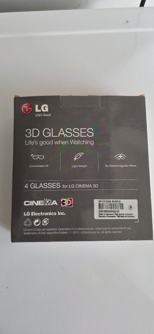 LG Cinema 3D Glasses (Category: Sunglasses & Eyewear) located in Manila. Submitted by mnmlst7111 (Listing ID 1433365067, Image 2). Description: - LG Cinema 3D Glasses (4 glasses included) - Designed for LG Cinema 3D televisions - Enhances 3D viewing experience - Comes in original packaging - Red and white box with LG logo.