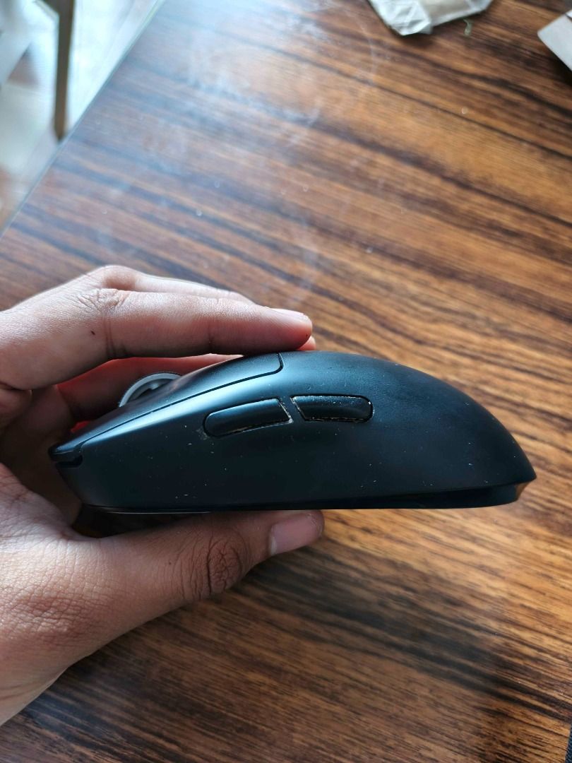 Logitech G Pro X Superlight Wireless Gaming Mouse (Category: Mouse & Mousepads) located in Los Banos. Submitted by justinthegreat53 (Listing ID 1433348729, Image 3). Description: - Logitech G Pro X Superlight wireless gaming mouse - Wireless connectivity - Color: Black with light blue accent - Includes: Mouse, USB receiver, and charging cable - Features the Logitech "G" logo - Charging cable color: Pink - No box - With Cable pero hindi yung nasa 