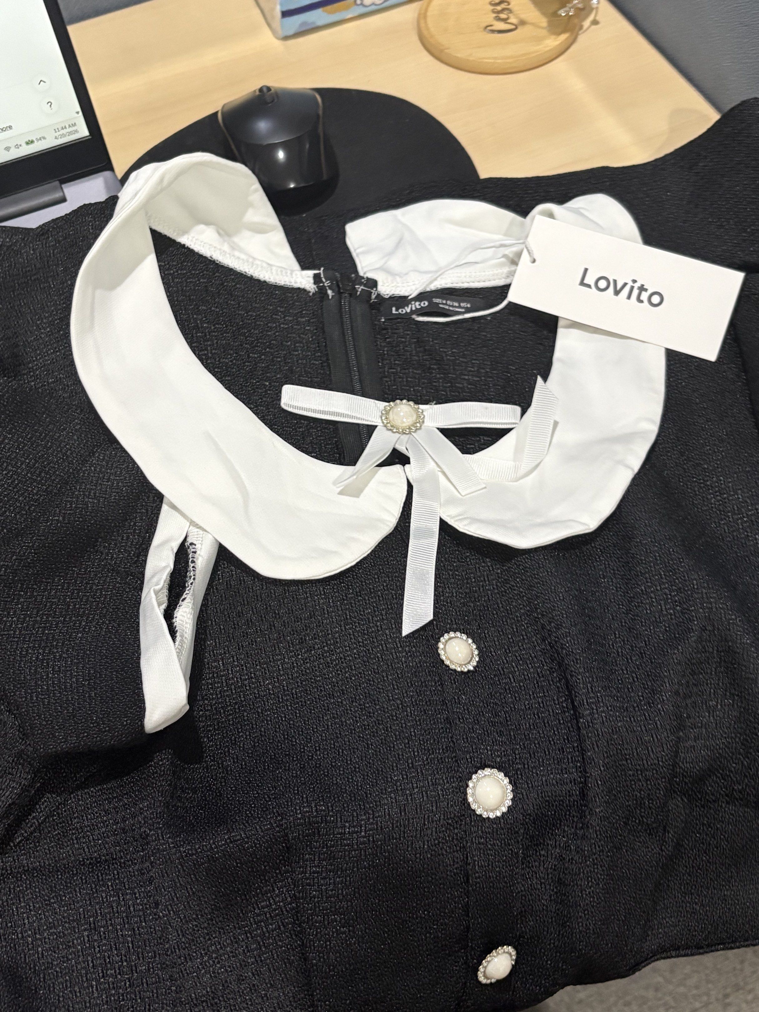 Lovito Black Dress with White Collar (Category: Dresses) located in Quezon City. Submitted by cesscstr (Listing ID 1433239920, Image 1). Description: - Lovito black dress - White Peter Pan collar - Decorative pearl buttons - Bow detail at neckline - Zipper closure - Size: M - Textured fabric.