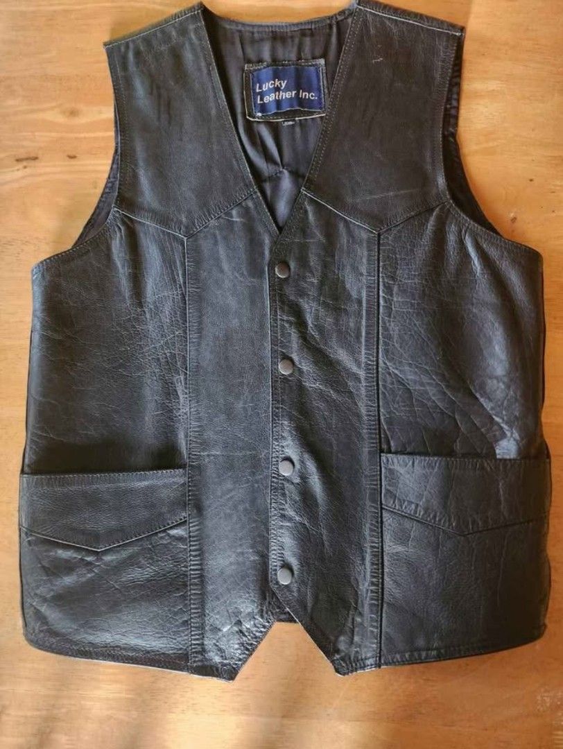 Harley Davidson Motorcycles Thick Leather Vest (Category: Vests) located in Rizal. Submitted by zjs46 (Listing ID 1433240766, Image 2). Description: Patch is original Harley Davidson, had it sewn at the back of the genuine thick leather vest. In very good condition. Payment thru g-cash. Delivery thru Lbc or lalamove care of buyer. Antipolo loc.