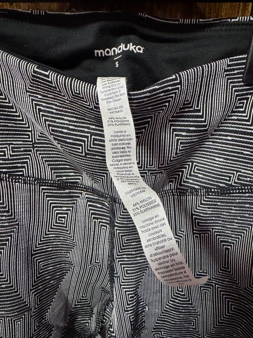Manduka Geometric Print Leggings - Size S (Category: Activewear) located in Las Pinas. Submitted by emdjss (Listing ID 1433250541, Image 1). Description: - BRAND NEW Manduka - Manduka leggings - Geometric black and white print - Size: S - Stirrup design - High waist - Material: Nylon and polyester blend.