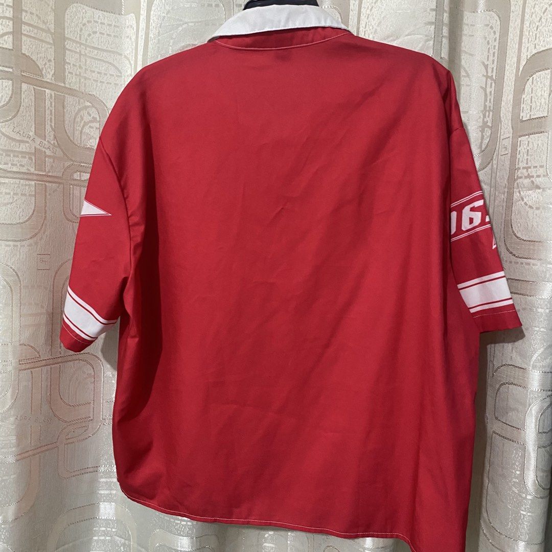 Manfinity Polo (Category: Tshirts & Polo Shirts ) located in Mabalacat. Submitted by commando07 (Listing ID 1433367884, Image 3). Description: - Manfinity button-up shirt - Size: M - Features: White collar and sleeve accents - Design: "15" on front, "16" on back.