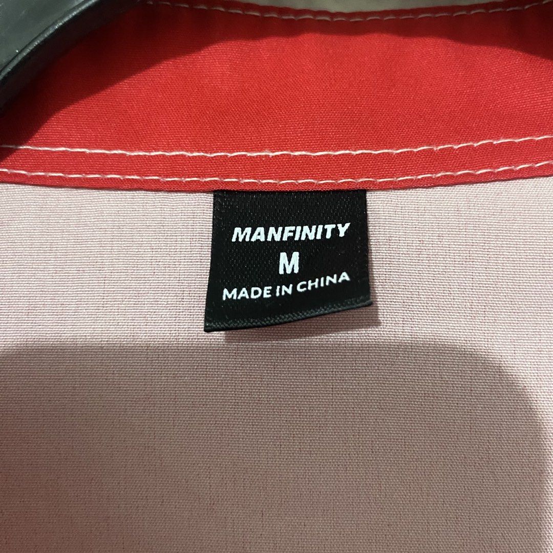 Manfinity Polo (Category: Tshirts & Polo Shirts ) located in Mabalacat. Submitted by commando07 (Listing ID 1433367884, Image 2). Description: - Manfinity button-up shirt - Size: M - Features: White collar and sleeve accents - Design: "15" on front, "16" on back.