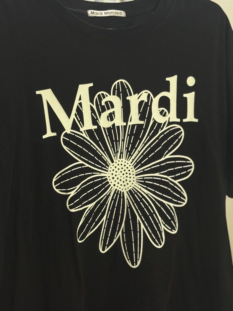 Mardi Mercredi Flower Tee - Black (Category: Shirts) located in Manila. Submitted by curateandcreate (Listing ID 1433390284, Image 2). Description: - Mardi Mercredi black t-shirt - Features a large daisy graphic - Brand name detail on neckline - Made of 100% cotton - One size - Manufactured in Korea, September 2024 Freesize - oversize fit 20-25 width.