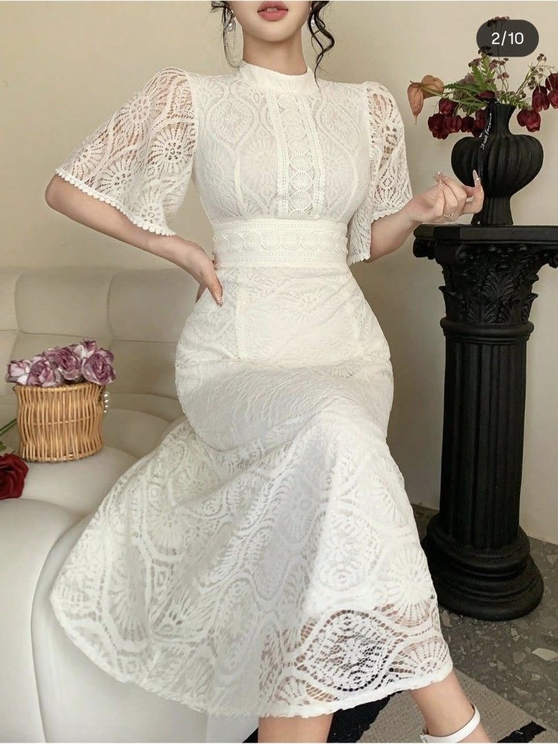 MEDIUM White Lace Dress (Category: Dresses) located in Caloocan City. Submitted by saramedeclutter (Listing ID 1432676667, Image 1). Description: - Intricate lace detailing - High neckline - Short flutter sleeves - Fitted waist with flared skirt - Perfect for special occasions.