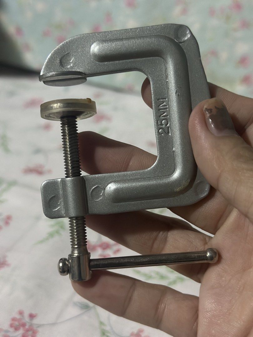 Metal C-Clamp 25mm (Category: Construction Tools & Equipment) located in Davao. Submitted by favoritepreloved (Listing ID 1433370107, Image 1). Description: This is a 25mm (approximately 1-inch) metal C-clamp, used for holding materials securely in woodworking or metalworking projects. .