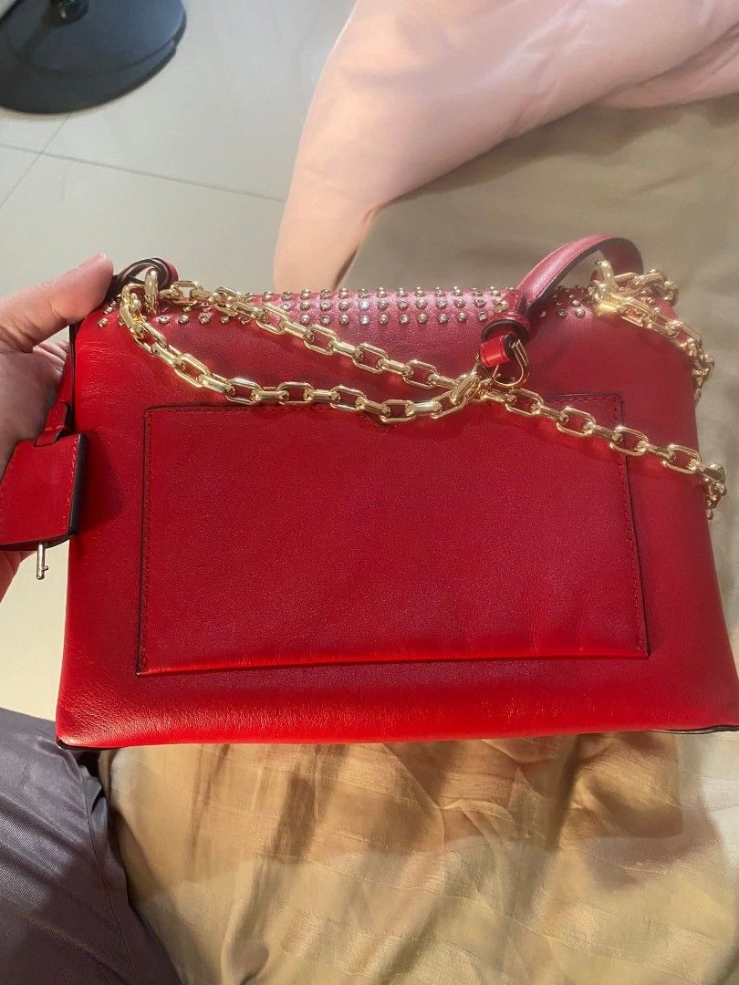 MICHAEL KORS CECE (Category: Luxury Bags & Wallets) located in Manila. Submitted by bellissima05 (Listing ID 1433333864, Image 3). Description: MICHAEL KORS CECE CHAIN STRAP, BRIGHT RED, MEDIUM, LEATHER..