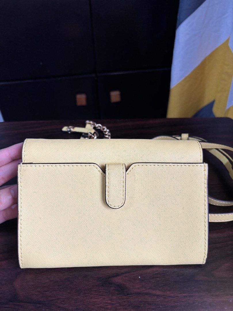 Michael Kors Yellow Crossbody Wallet (Category: Luxury Bags & Wallets) located in Manila. Submitted by nigel_ky (Listing ID 1433304902, Image 2). Description: - Michael Kors crossbody wallet - Vibrant yellow color - Detachable chain strap - Adjustable long strap - Multiple card and cash compartments - Snap closure - Gold-tone logo - Yellow interior loc : malate, manila mop : gcash mod : lalamove + manage your expectations :).