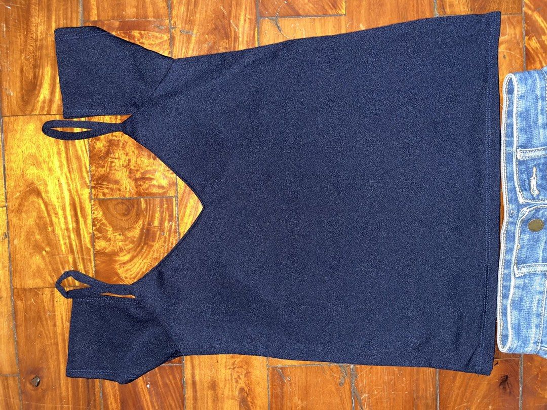 Navy Top with Sleeves (Category: Blouses) located in Manila. Submitted by declitterclutter (Listing ID 1433261076, Image 3). Description: - Navy blue spaghetti strap top with V-neck. - No COD - Buyer will shoulder the shipping fee - Decluttering - Some thrifted finds - No to overpricing!! - No to haggling!! - XS to S.