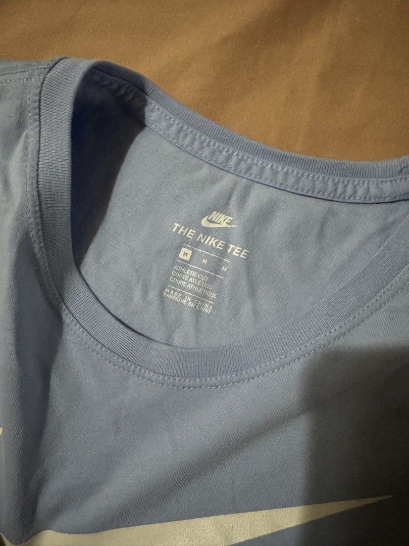 Nike Just Do It Tee - Medium (Category: Activewear) located in Dinalupihan. Submitted by declutteredbyaly (Listing ID 1433329533, Image 2). Description: - Nike "Just Do It" T-shirt - Light blue color - Features Nike swoosh logo - Size: Medium - Style: "The Nike Tee" - Runs small.