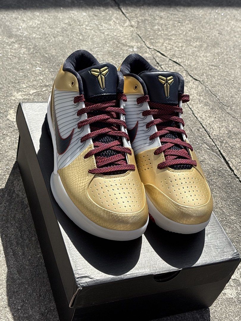 Nike Kobe 4 Protro Gold Medal (Category: Sneakers) located in Mabalacat. Submitted by boldstorm_48a771 (Listing ID 1433384603, Image 3). Description: - Nike Kobe 4 Protro - Gold and white colorway - Burgundy laces - Black swoosh and collar - Kobe logo on tongue - White and red sole - Comes with original box.