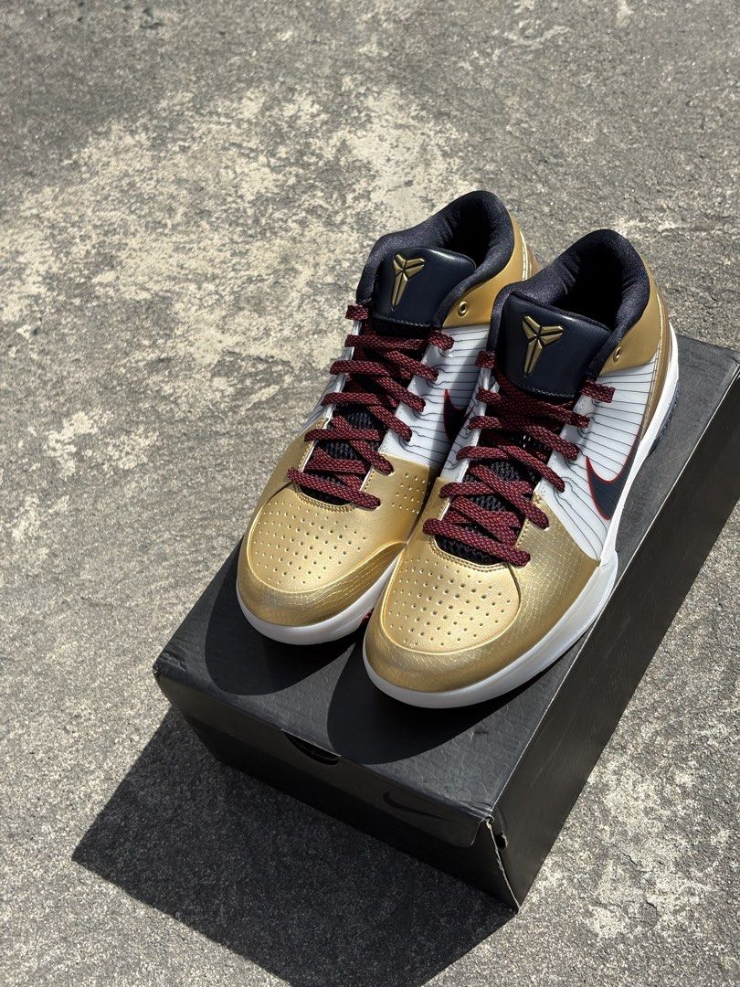 Nike Kobe 4 Protro Gold Medal (Category: Sneakers) located in Mabalacat. Submitted by boldstorm_48a771 (Listing ID 1433384603, Image 2). Description: - Nike Kobe 4 Protro - Gold and white colorway - Burgundy laces - Black swoosh and collar - Kobe logo on tongue - White and red sole - Comes with original box.