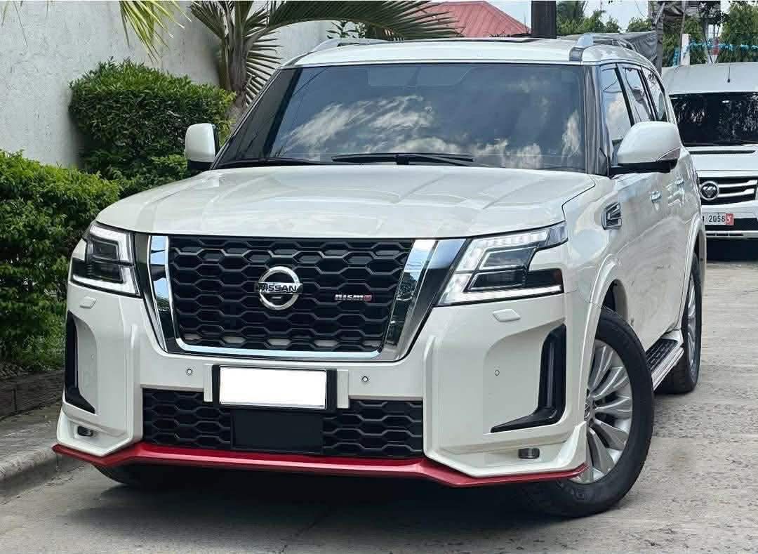 Nissan Patrol Royale Loaded Auto (Category: Used Cars) located in Manila. Submitted by quality_cars (Listing ID 1433315859, Image 2). Description: Grabe naman to, pinagsama yung Sporty look and VIP look mga Boss Nissan Patrol Royale 2019 A/T Loaded All power features Push start / keyless entry Sunroof / moonroof Power seats Power tailgate 360 camera 2 headrest monitor Tan orange interior Nismo kit ( worth 250k ) 20inch Oem mags 40,000 only Owners