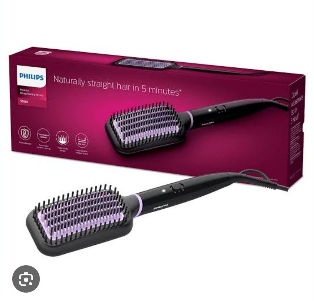 Philips Heated Straightening Brush (Category: Hair) located in Noveleta. Submitted by heyitsroxy (Listing ID 1433266532, Image 1). Description: - Philips Heated Straightening Brush - Model 3000 - Black design with purple bristles - Achieve straight hair in 5 minutes - almost brand new never got to use.