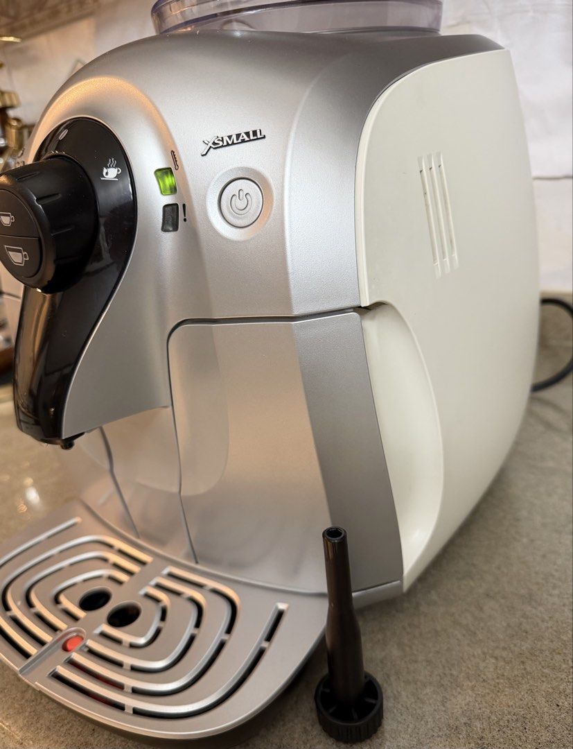 Philips Saeco Xsmall Automatic Espresso Coffee Machine (Category: Coffee Machines & Makers) located in Paranaque City. Submitted by jaysanti (Listing ID 1433393215, Image 2). Description: Philips Saeco xsmall seldom used and I perfect condition. Compact and perfect for small spaces. Strong steam for making cappuccino or frothing milk, hot water for tea. 0-9-1-5-2-8-7-2-7-5-6 bean to cup automatic .