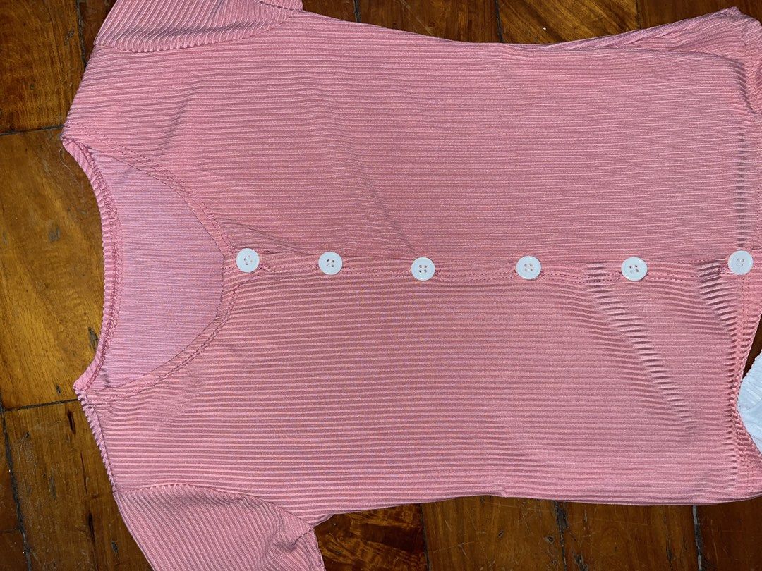 Pink Ribbed Top with Buttons (Category: Blouses) located in Manila. Submitted by declitterclutter (Listing ID 1433254246, Image 3). Description: - Ribbed, button-down top in dusty rose - Short sleeves - White buttons - No COD - Buyer will shoulder the shipping fee - Decluttering - Some thrifted finds - No to overpricing!! - No to haggling!! - Fits XS to S.