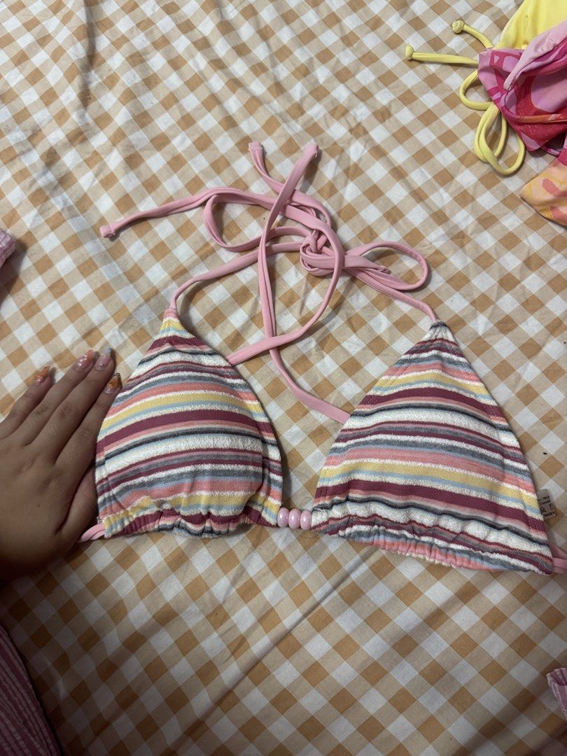 Pink Striped Bikini Top Medium (Category: Bikinis & Swimsuits) located in Leyte. Submitted by eizag (Listing ID 1433297637, Image 2). Description: - Location: Cebu City -Colorful striped bikini top - Pink straps - Triangle shape with beaded accents - Halter neck design - Adjustable tie back - Made from soft, comfortable fabric - use my hand for size reference! - full coverage for medium chested girlies - it has matching bottoms and shorts but sti