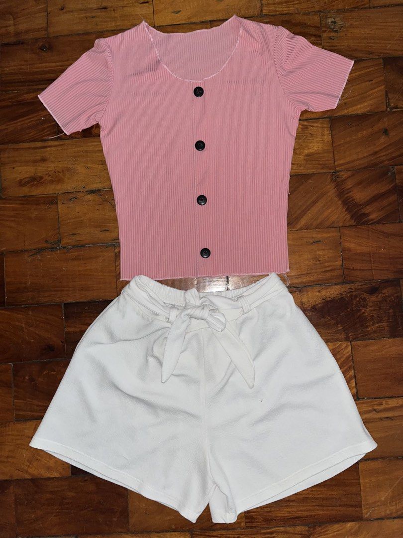 Pink Top with Buttons (Category: Shirts) located in Manila. Submitted by declitterclutter (Listing ID 1433254506, Image 1). Description: - Pink ribbed top with buttons - Short sleeves and round neckline - No COD - Buyer will shoulder the shipping fee - Decluttering - Some thrifted finds - No to overpricing!! - No to haggling!! - XS to S.