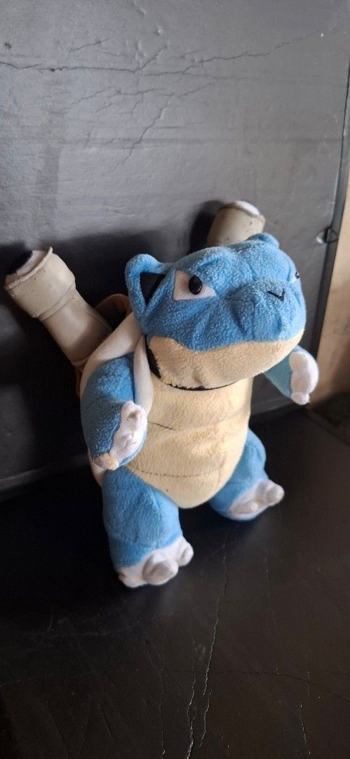Pokemon Blastoise Plush Toy (Category: Plushies & Soft Toys) located in Valenzuela. Submitted by winssian (Listing ID 1433240029, Image 1). Description: - Blastoise plush toy - Features iconic blue and beige colors - Detailed design with shell and water cannons - Medium size, suitable for display or play.