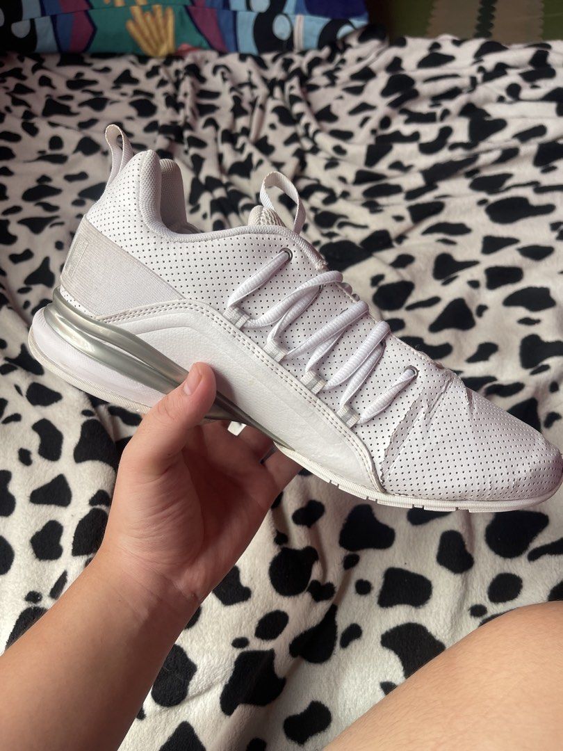 Puma Axelion Running Shoes - White (Category: Sneakers) located in Manila. Submitted by meloraye_14 (Listing ID 1433216129, Image 3). Description: - Puma Axelion running shoes - Color: White - Size: US 9, UK 8, EUR 42, CM 27 - Breathable upper - Lace-up closure - Cushioned midsole for comfort - Durable rubber outsole for traction - Puma logo on side and heel.