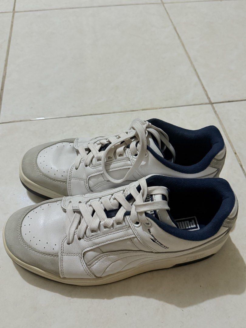 Puma Slipstream Lo Retro Sneakers - US 9 (Category: Sneakers) located in Carmona. Submitted by aady.22 (Listing ID 1433310501, Image 1). Description: Puma Slipstream Lo Retro (Navy Blue) Size: US 9 Mens RFS: Too many sneakers All good just a little yellow sa side and crease, due to normal wearing. Very maselan yung may-ari everytime na gagamitin yung shoes ay linis rin agad. No box included. Bought for:₱6,800 sa Capital Selling Price:₱2,500 LBC/L