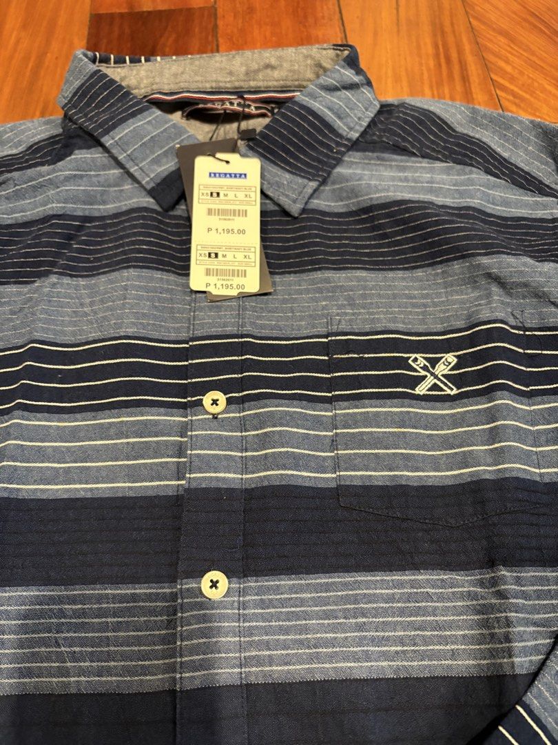 Regatta Striped Long Sleeve Shirt (Category: Tshirts & Polo Shirts ) located in Pasig City. Submitted by mvsdb (Listing ID 1433307441, Image 2). Description: BRAND NEW. WITH TAG!!! - Regatta long sleeve shirt - Blue stripes - Button-down front - Chest pocket - Collared neckline - Regatta logo on chest - Original price tag attached - Available sizes: XS, S, M, L.