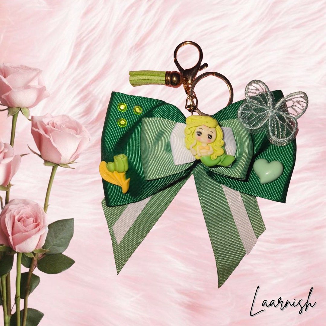 Ribbon Keychain (Category: Handmade Craft) located in Santa Rosa. Submitted by laarnish (Listing ID 1433262143, Image 1). Description: These eye-catching keychain add a touch of whimsy and personality to any bag. 🌺 Handmade Accessories! 🌺 Color may slightly differ due to lighting. .