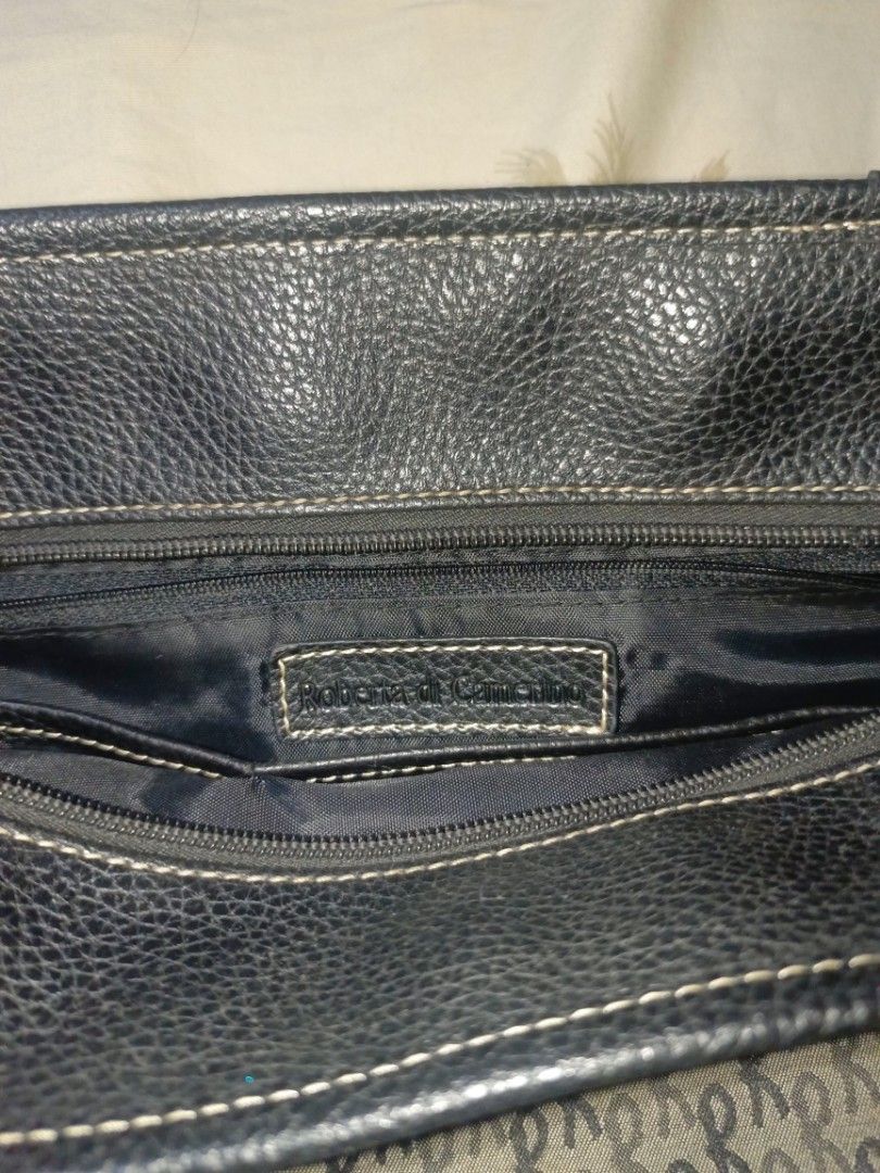 Roberta Di Camerino Y2K Shoulder Bag (Category: Luxury Bags & Wallets) located in Rizal. Submitted by nokorimono. (Listing ID 1433360710, Image 2). Description: The "It-Girl" bag for your Y2K outfits. The Detail: Roberta Di Camerino is known for artistic and playful designs. This bag is a total vintage gem that fits right into today's trends. Condition: Missing zipper handle (zipper still works, you can just add a cute charm or a replacement pull