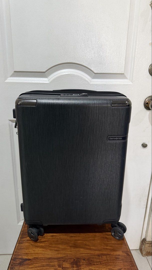 Samsonite Carry-on Luggage (Category: Luggage) located in Taytay. Submitted by anrap (Listing ID 1433344802, Image 1). Description: Samsonite Carry-On Luggage Spinner 55/20 Brushed Black Warranty certificate still intact Bought in Rustans Shangri-la Dec 2023 Still negotiable just don’t lowball Rfs: decluttering.