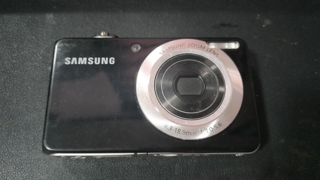 Samsung PL100 Digital Camera | DEFECT/FOR PARTS (Category: Cameras) located in Malolos. Submitted by cvlei12 (Listing ID 1433298565, Image 1). Description: - Samsung PL100 digital camera - Not working even with battery - Unsure of other features if working.