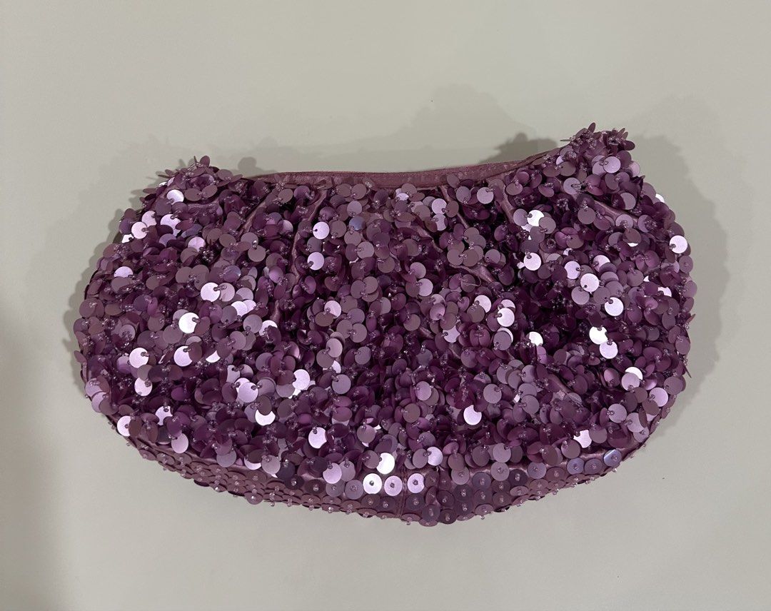 Sequin Clutch Bag - Purple (Category: Clutches) located in Manila. Submitted by caseller26 (Listing ID 1433326388, Image 1). Description: - Purple sequin clutch bag - Rounded shape - Soft material - Secure zipper closure - Perfect for special occasions and nights out.