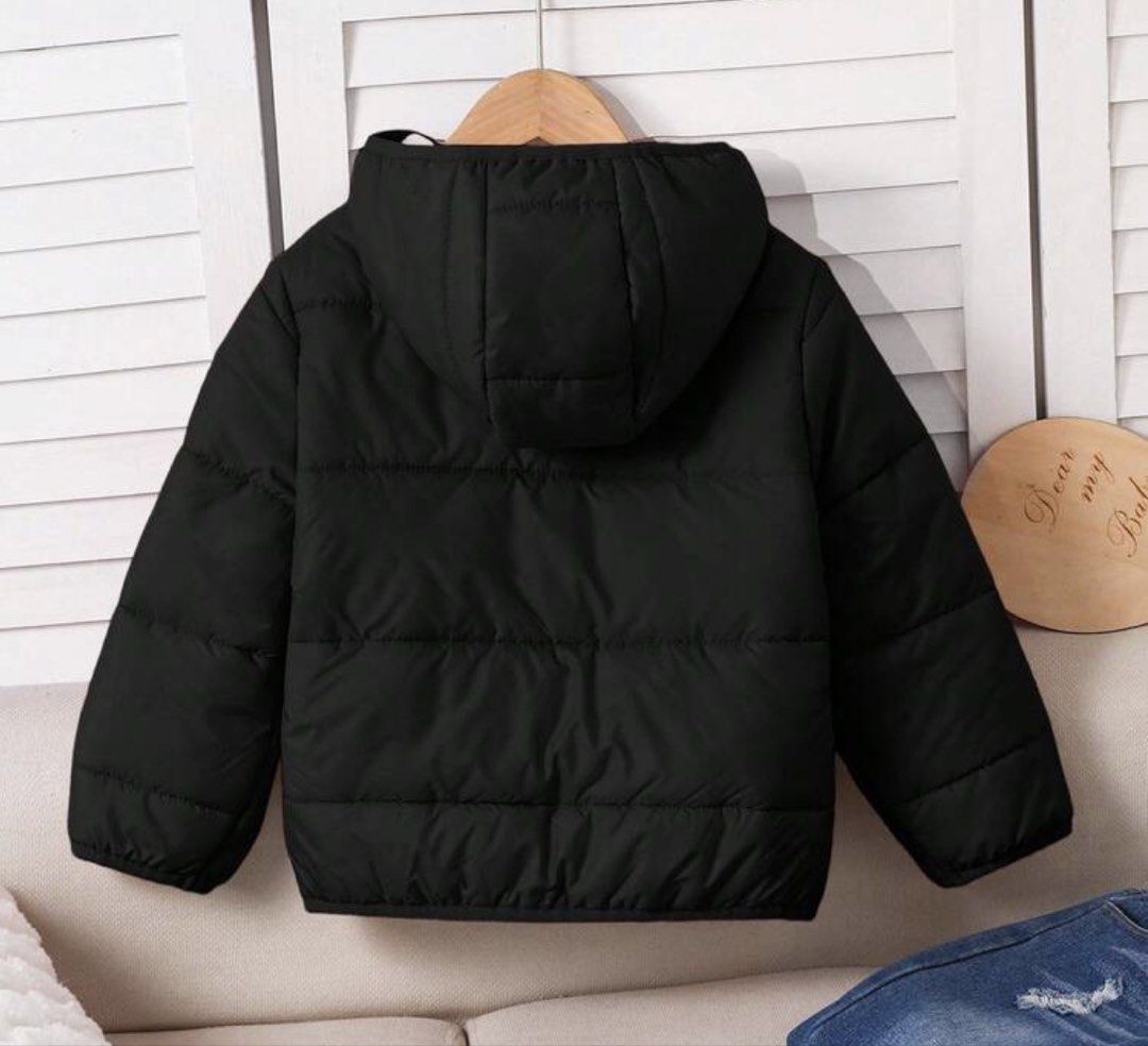Shein Black Puffer Jacket with Hood (Category: Babies & Kids Fashion) located in Manila. Submitted by acbefgh (Listing ID 1433304340, Image 2). Description: Shein black puffer jacket with hood. Features a soft white inner lining and zipper closure. Suitable for boys and girls. Classic design. 7T size.